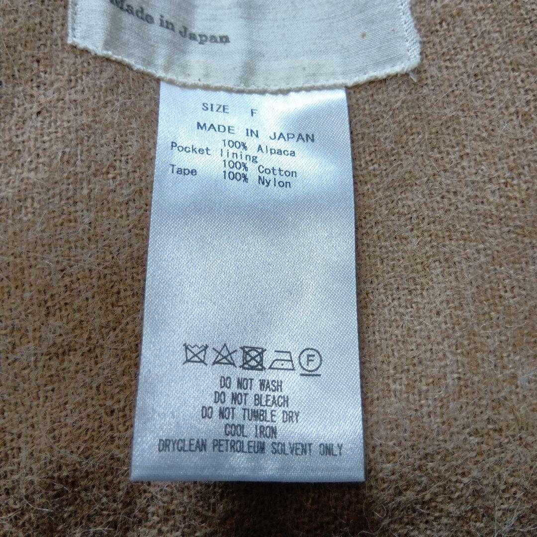 Text ケープコート