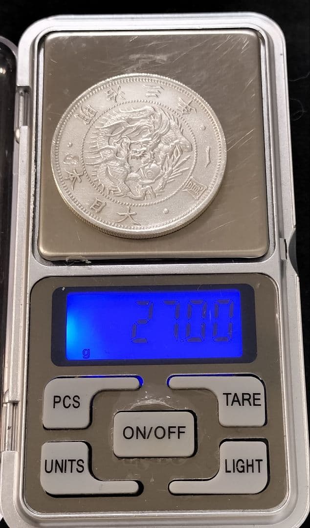 ひ*ん様 旧一円銀貨明治3年 目方約27g 銀含有率約90% 一圓銀貨古銭